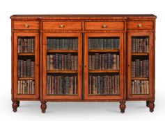 Y A GEORGE III SATINWOOD AND ROSEWOOD CROSSBANDED BREAKFRONT BOOKCASE, CIRCA 1790-1800