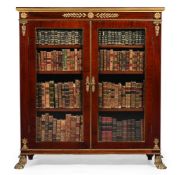 A MAHOGANY AND GILT METAL MOUNTED BOOKCASE, IN REGENCY STYLE, LATE 19TH CENTURY