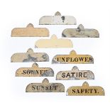 A SET OF TEN PAINTED LEAD NAME PLATES FOR HOUNDS OR HORSES, FIRST HALF 19TH CENTURY