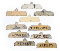 A SET OF TEN PAINTED LEAD NAME PLATES FOR HOUNDS OR HORSES, FIRST HALF 19TH CENTURY