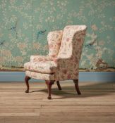 A VICTORIAN WALNUT WING ARMCHAIR BY HOWARD & SONS, IN GEORGE II STYLE, LATE 19TH CENTURY