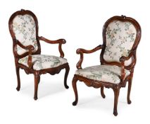 A PAIR OF ITALIAN CARVED WALNUT ARMCHAIRS, PROBABLY VENETIAN, CIRCA 1770