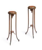 A PAIR OF GEORGE III CARVED SATINWOOD AND POLYCHROME DECORATED TORCHÈRES, LATE 18TH CENTURY