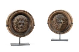 A PAIR OF TERRACOTTA HIGH RELIEF LION MASK ROUNDELS, PROBABLY ITALIAN, EARLY 19TH CENTURY