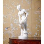 GUGLIELMO PUGI (CIRCA 1850-1915), A CARVED WHITE MARBLE FIGURE OF THE BATHING VENUS