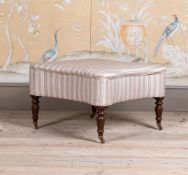 A LARGE MAHOGANY AND ROBERT KIME UPHOLSTERED FOOTSTOOL, IN REGENCY STYLE, CONTEMPORARY