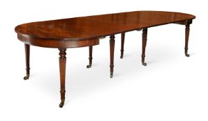 A REGENCY MAHOGANY D-END TELESCOPIC DINING TABLE, IN THE MANNER OF GILLOWS, CIRCA 1815
