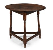 A QUEEN ANNE OAK AND ELM CRICKET TABLE, CIRCA 1710