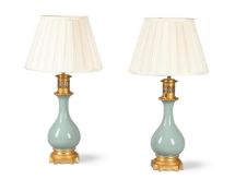 A PAIR OF FRENCH GILT BRONZE MOUNTED CELADON CERAMIC LAMP BASES, MID TO LATE 19TH CENTURY