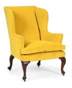 A GEORGE I WALNUT WING ARMCHAIR, CIRCA 1725
