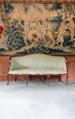 A GEORGE III CARVED MAHOGANY SOFA, IN FRENCH HEPPLEWHITE STYLE, CIRCA 1770