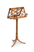 A REGENCY SATINWOOD, PARCEL-GILT AND GILT BRASS MOUNTED DUET STAND, BY ERARD, CIRCA 1820