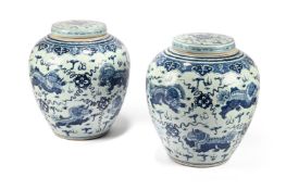 A LARGE PAIR OF CHINESE BLUE AND WHITE VASE AND COVERS, IN THE KANGXI MANNER, 20TH CENTURY
