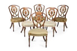 AN UNUSUAL SET OF SIX GEORGE III POLYCHROME PAINTED CHAIRS, CIRCA 1790
