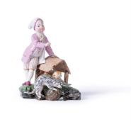 A HÖCHST FIGURE OF A BOY WITH A DOG AND A CAT, CIRCA 1770