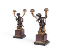 A PAIR OF FRENCH GILT AND PATINATED BRONZE MOUNTED MARBLE CANDELABRA, EARLY 19TH CENTURY