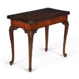 A GEORGE III MAHOGANY SERPENTINE FOLDING CARD TABLE, IN THE MANNER OF PAUL SAUNDERS, CIRCA 1780
