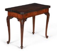 A GEORGE III MAHOGANY SERPENTINE FOLDING CARD TABLE, IN THE MANNER OF PAUL SAUNDERS, CIRCA 1780