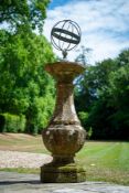A CARVED COTSWOLD STONE ARMILLARY SUNDIAL, 18TH CENTURY