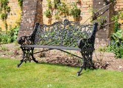A LATE VICTORIAN CAST IRON GARDEN BENCH, LATE 19TH CENTURY