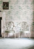 A PAIR OF GEORGE III WHITE AND GREEN PAINTED ARMCHAIRS, POSSIBLY BY GILLOWS, CIRCA 1780