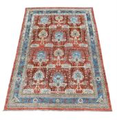 A USHAK CARPET, AFTER DESIGNS BY C.F.A. VOYSEY