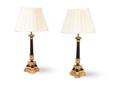 A PAIR OF FRENCH GILT AND PATINATED BRONZE TRIFORM LAMP BASES, FIRST HALF OF THE 19TH CENTURY