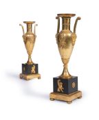A PAIR OF FRENCH EMPIRE GILT AND PATINATED NEOCLASSICAL VASES, CIRCA 1810