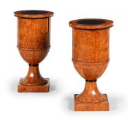 Y A PAIR OF BALTIC KERALIAN BIRCH PEDESTAL CUPBOARDS, CIRCA 1830