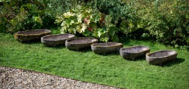 A SET OF SIX STONE COMPOSITION TROUGHS, LATE 20TH CENTURY