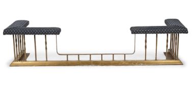 A LARGE BRASS AND UPHOLSTERED CLUB FENDER, 20TH CENTURY