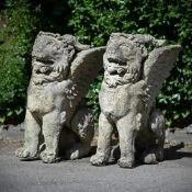 A PAIR OF STONE COMPOSITION GRIFFINS, 20TH CENTURY