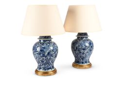 A PAIR OF CHINESE BLUE AND WHITE VASE LAMPS, IN KANGXI STYLE, 19TH CENTURY