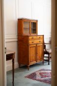 A GEORGE III SATINWOOD AND AMARANTH SECRETAIRE CABINET, ATTRIBUTED TO GILLOWS