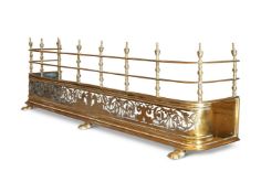 A LATE GEORGE III BRASS FENDER, CIRCA 1810