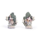 A PAIR OF DERBY FIGURAL TWO-BRANCH CANDLESTICKS OF A SHEPHERD AND SHEPHERDESS, CIRCA 1770