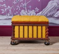 Y AN EARLY VICTORIAN ROSEWOOD AND LINEN UPHOLSTERED OTTOMAN, CIRCA 1840