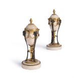 A PAIR OF GEORGE III GILT AND PATINATED METAL MOUNTED WHITE MARBLE CASSOLETTES, CIRCA 1800