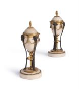 A PAIR OF GEORGE III GILT AND PATINATED METAL MOUNTED WHITE MARBLE CASSOLETTES, CIRCA 1800