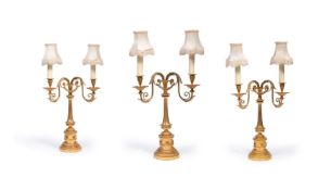 A SET OF THREE GEORGE III STYLE GILT METAL TWIN BRANCH CANDELABRA, 20TH CENTURY