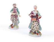 A PAIR OF DERBY FIGURES OF A JEWISH PEDDLER AND COMPANION, CIRCA 1760
