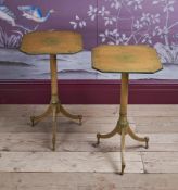 AN UNUSUAL PAIR OF REGENCY CREAM AND GREEN PAINTED TRIPOD TABLES, CIRCA 1815