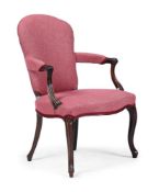 A GEORGE III CARVED MAHOGANY ARMCHAIR, IN HEPPLEWHITE STYLE, 18TH CENTURY