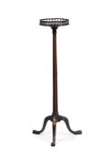 A CARVED MAHOGANY TORCHERE STAND, IN GEORGE III STYLE, 19TH CENTURY