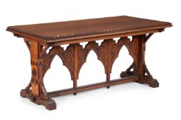 A VICTORIAN CARVED OAK AND RED PAINTED SERVING OR SIDE TABLE, LATE 19TH CENTURY