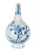 A CHINESE BLUE AND WHITE BOTTLE VASE