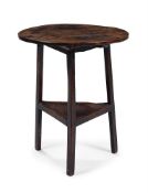 A GEORGE III OAK CRICKET TABLE, LATE 18TH CENTURY