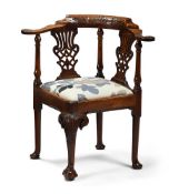 A GEORGE III WALNUT CORNER ARMCHAIR, SECOND HALF 18TH CENTURY