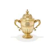 A SILVER GILT CUP AND COVER