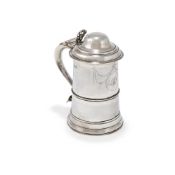 A GEORGE III SILVER TANKARD